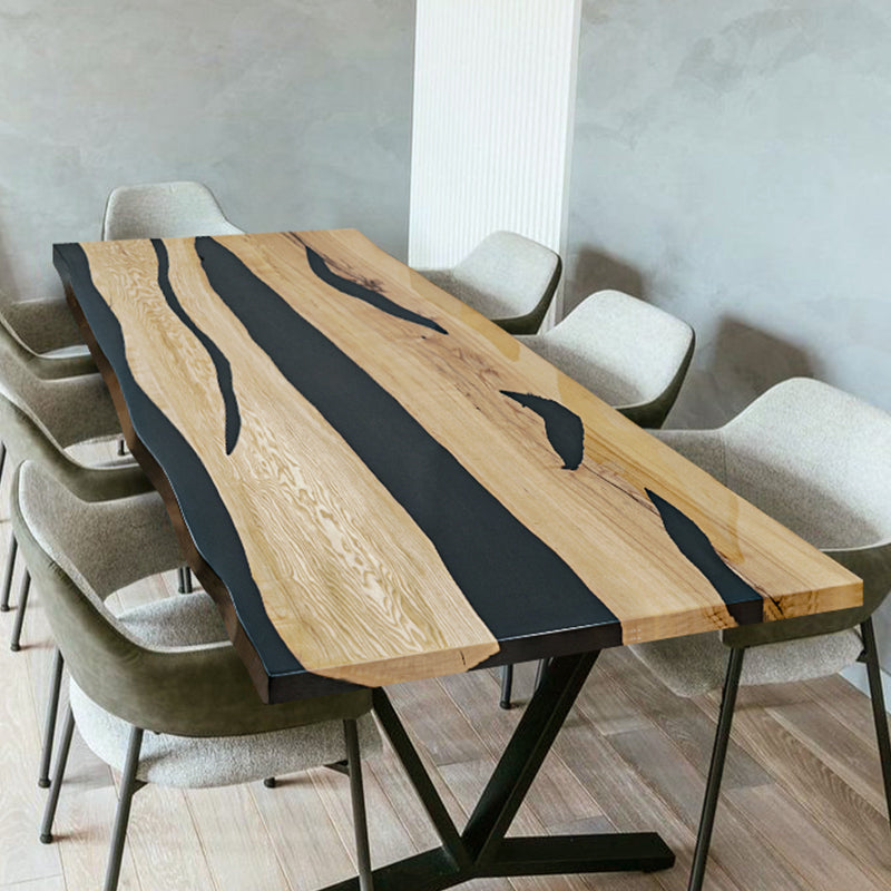 Handmade live edge epoxy resin dining table with natural wood slab and acrylic legs, perfect for modern interiors.
