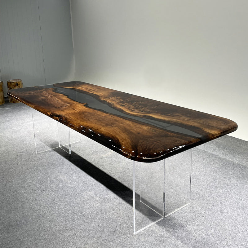 A beautiful epoxy resin wood coffee table with a unique natural wood grain pattern and epoxy resin inlays