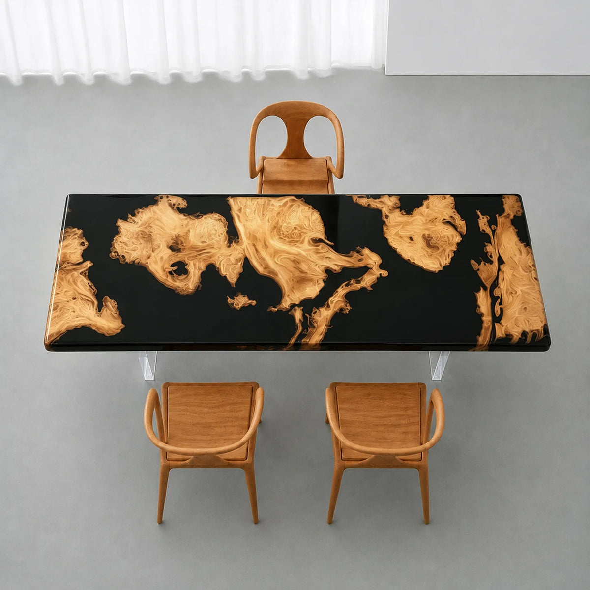 Executive boardroom table combining rich golden camphor wood patterns with deep black epoxy resin and a polished reflective surface
