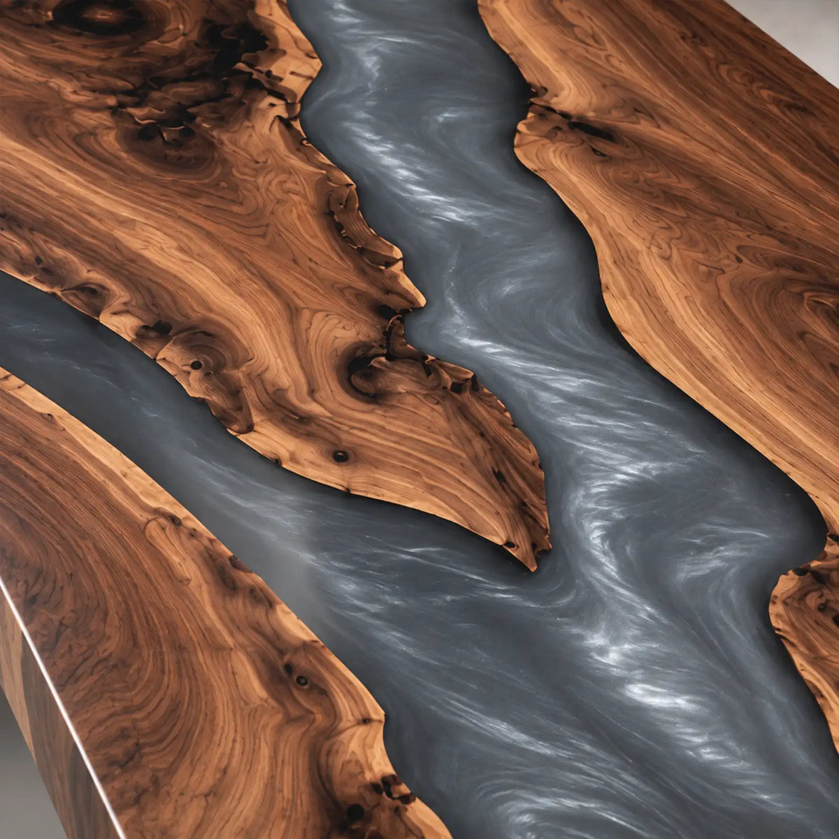 Large live edge black walnut boardroom table with an organic gray resin center, distinctive wood knots, and a spacious rectangular surface