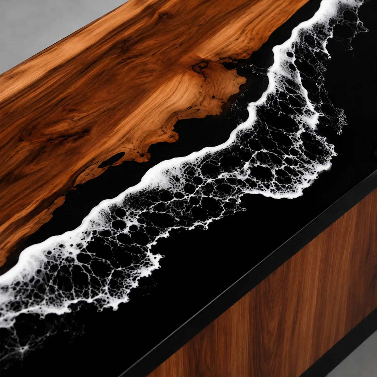 Luxury office reception desk with a bold black epoxy ocean design, realistic white crashing waves, and elegant walnut wood cabinetry