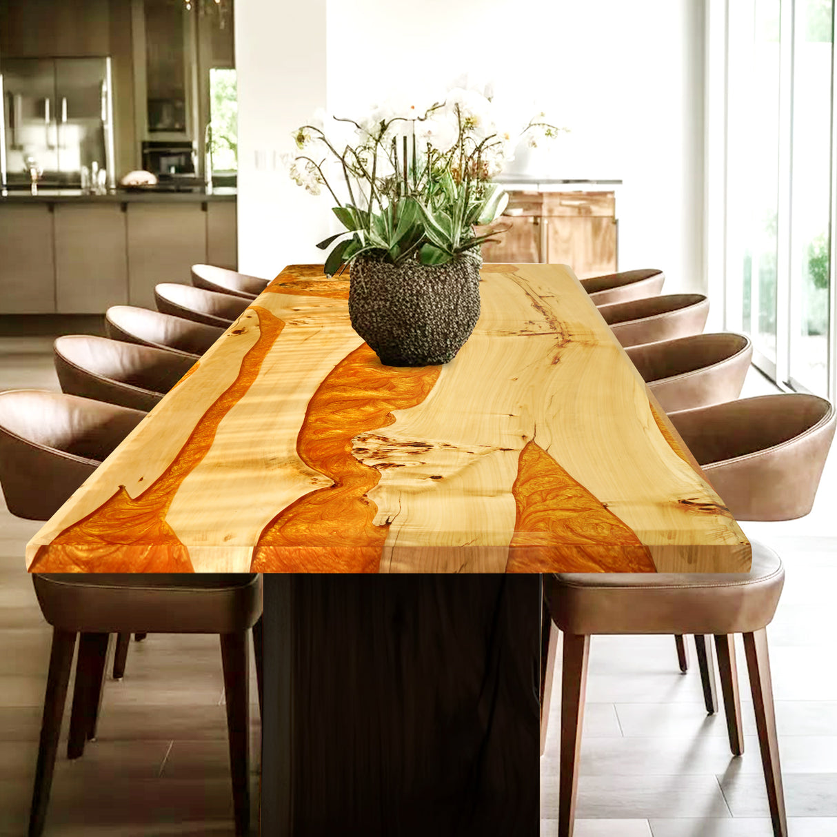 Rectangular epoxy - resin and wood dining table with a striking orange resin inlay, adorned with a plant centerpiece and surrounded by brown leather chairs.