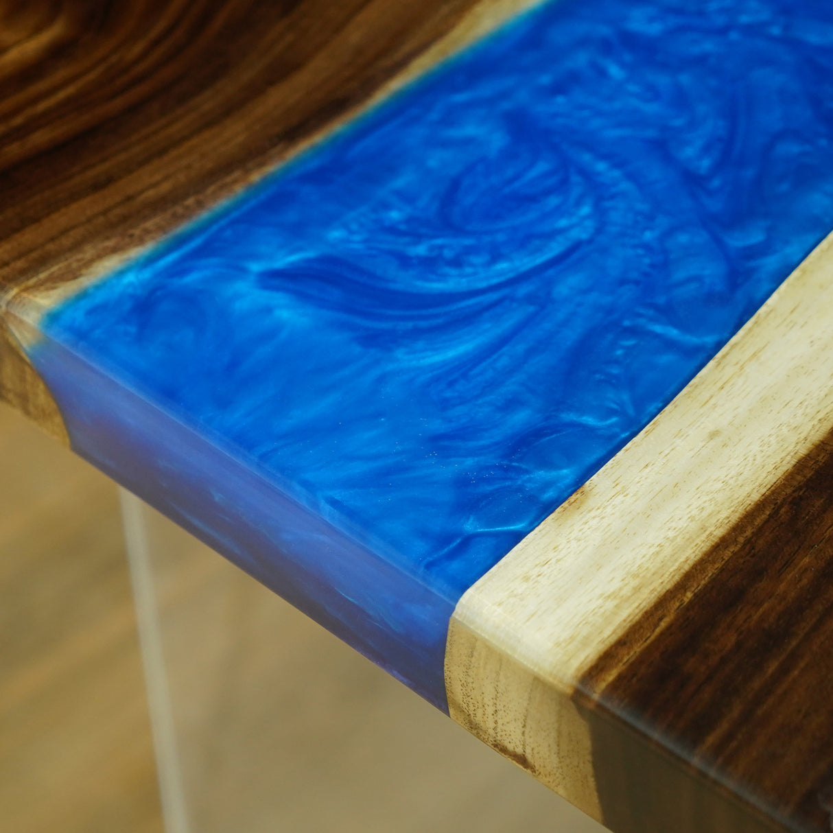 Blue Resin Inlay Detail on Wooden Table Edge