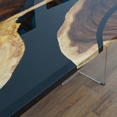 A handcrafted black epoxy resin river table with live edge wood, made from high-quality raw materials, perfect for dining or office use.