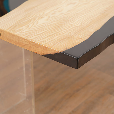 Handmade live edge epoxy resin dining table with natural wood slab and acrylic legs, perfect for modern interiors.