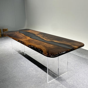 A beautiful epoxy resin wood coffee table with a unique natural wood grain pattern and epoxy resin inlays