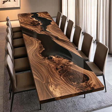 Handcrafted black walnut conference table featuring a flowing black epoxy resin river, dramatic natural wood grain, and a smooth polished finish