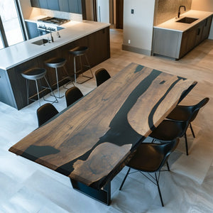 A coffee table made of walnut wood with dark black resin inlays