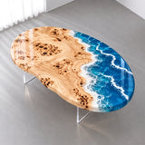 High-gloss poplar coffee tabletop featuring translucent aqua blue resin, layered white seafoam patterns, and beautifully detailed natural wood knots