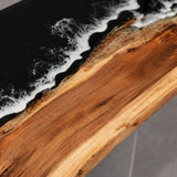 Luxury executive boardroom featuring a walnut and black ocean wave epoxy conference table with clear acrylic legs and contemporary office seating