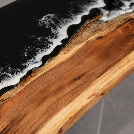 Luxury executive boardroom featuring a walnut and black ocean wave epoxy conference table with clear acrylic legs and contemporary office seating