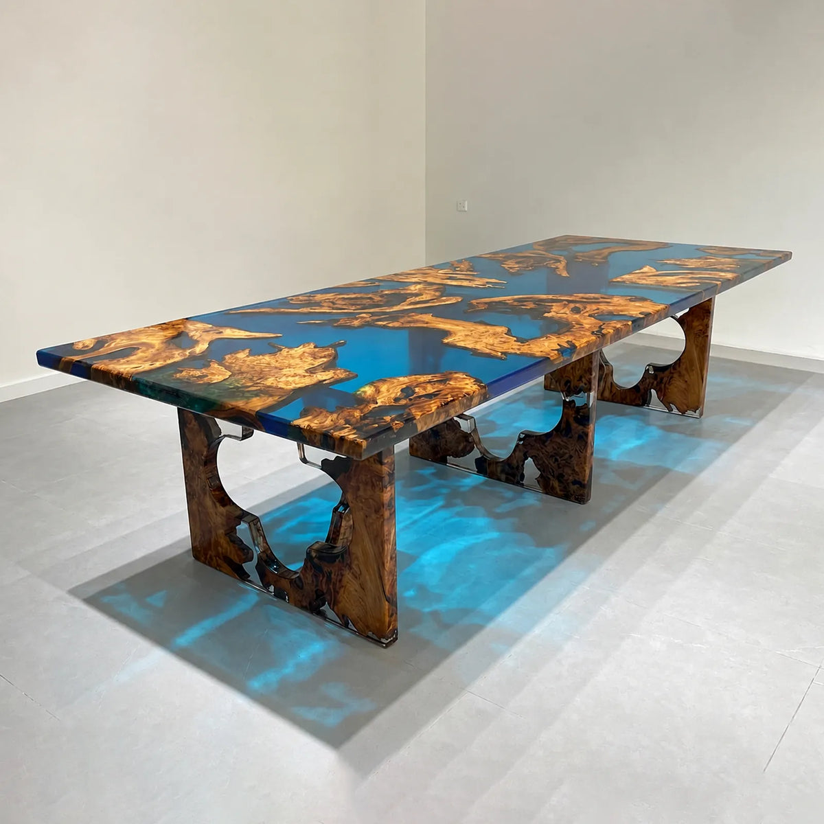 Olive burlwood and blue resin table with sculptural matching wood and resin legs