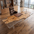 Poplar live edge office desk with natural burl grain set in a clear resin surface