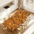 A resin table with a striking fir wood pattern, accompanied by two wooden chairs